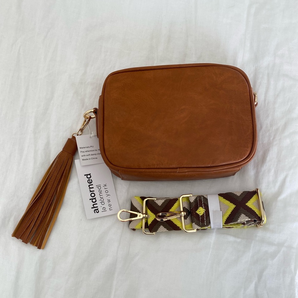 Ahdorned faux leather crossbody bag